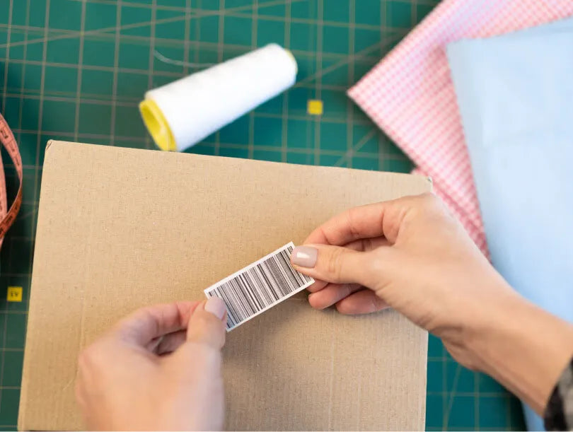 Barcode Labels Being Applied to Box